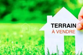Terrain angle à vendre au point e